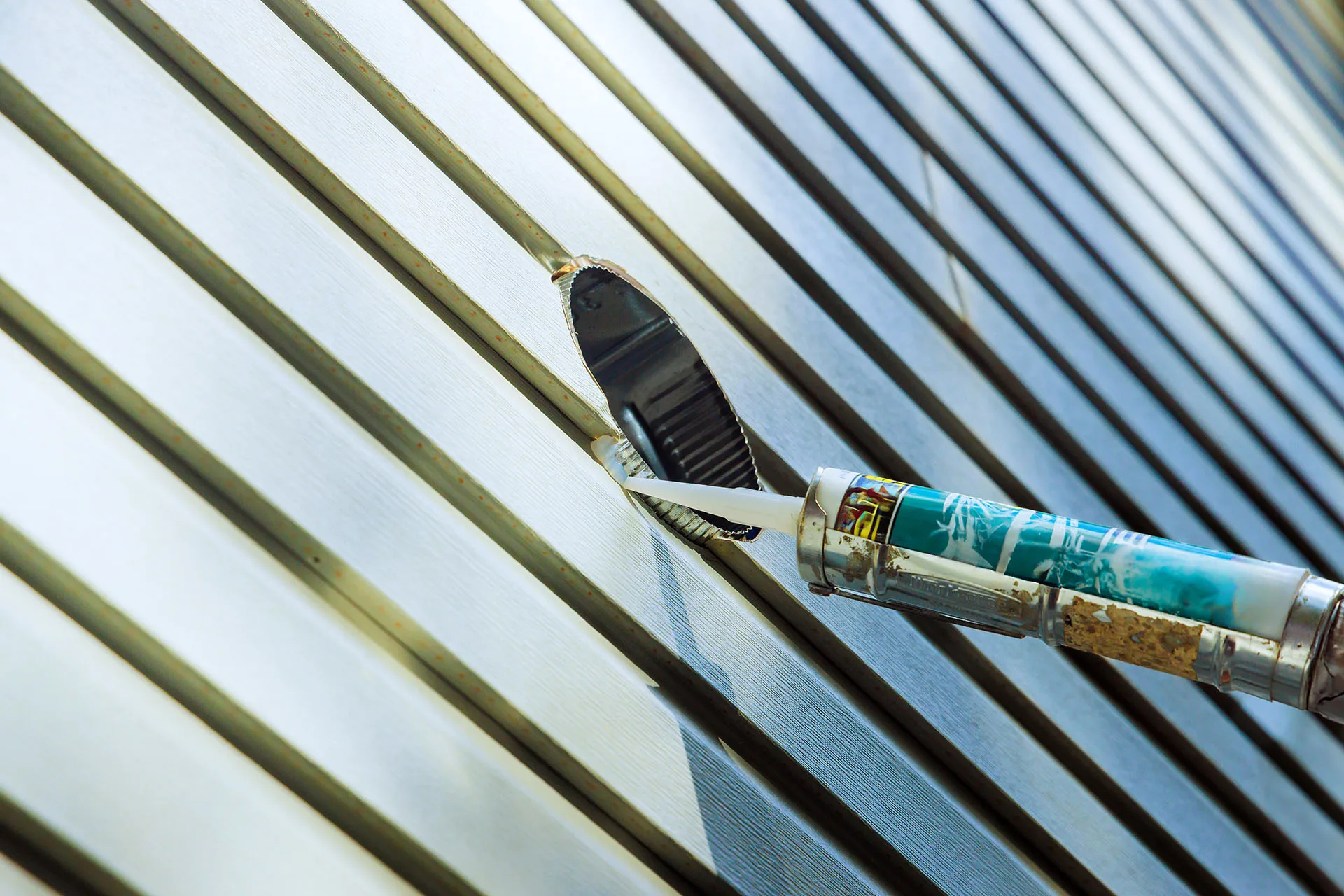 The Role of Caulking and Moisture Barriers in a Quality Capping Installation - Featured Image